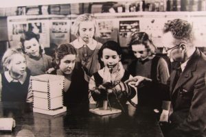 Mr. Robert Pullen, who came to Timsbury School as headmaster in 1940, teaching his favourite subject, 'Bees', on which he was an acknowledged expert. The picture, taken in 1946, shows pupils (left to right) Janet Holbrook (Meadgate), Jill Robbins, Monica Purnell, Barbara Bridges, Hazel Curtis and Rita Cottle
