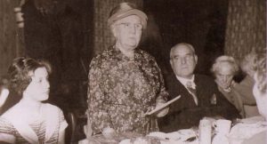 Kate Perrett presiding at the dinner of the Timsbury Male Voice Choir at Christmas 1960. Kate's grand-daughter Barbara is on her right and Teddy Carter of paulton on her left.