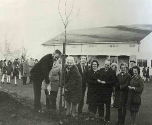 Geoffrey Dagger and Gladys Smith planting a tree to commemorate the Silver Jubilee of Queen Elizabeth II.