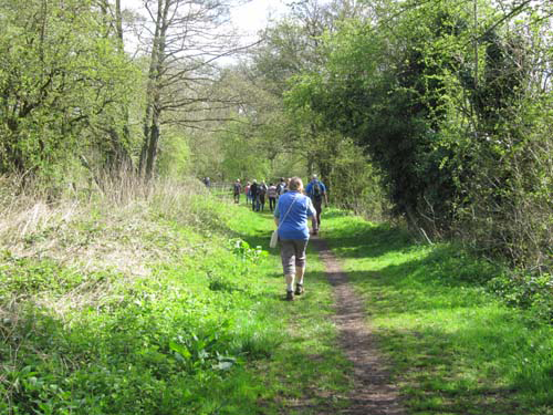 The former railway ran along the valley and is now a permissive path